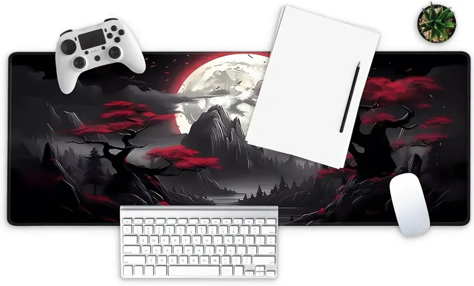 A dark and moody shot of a gaming mouse on a large mousepad.